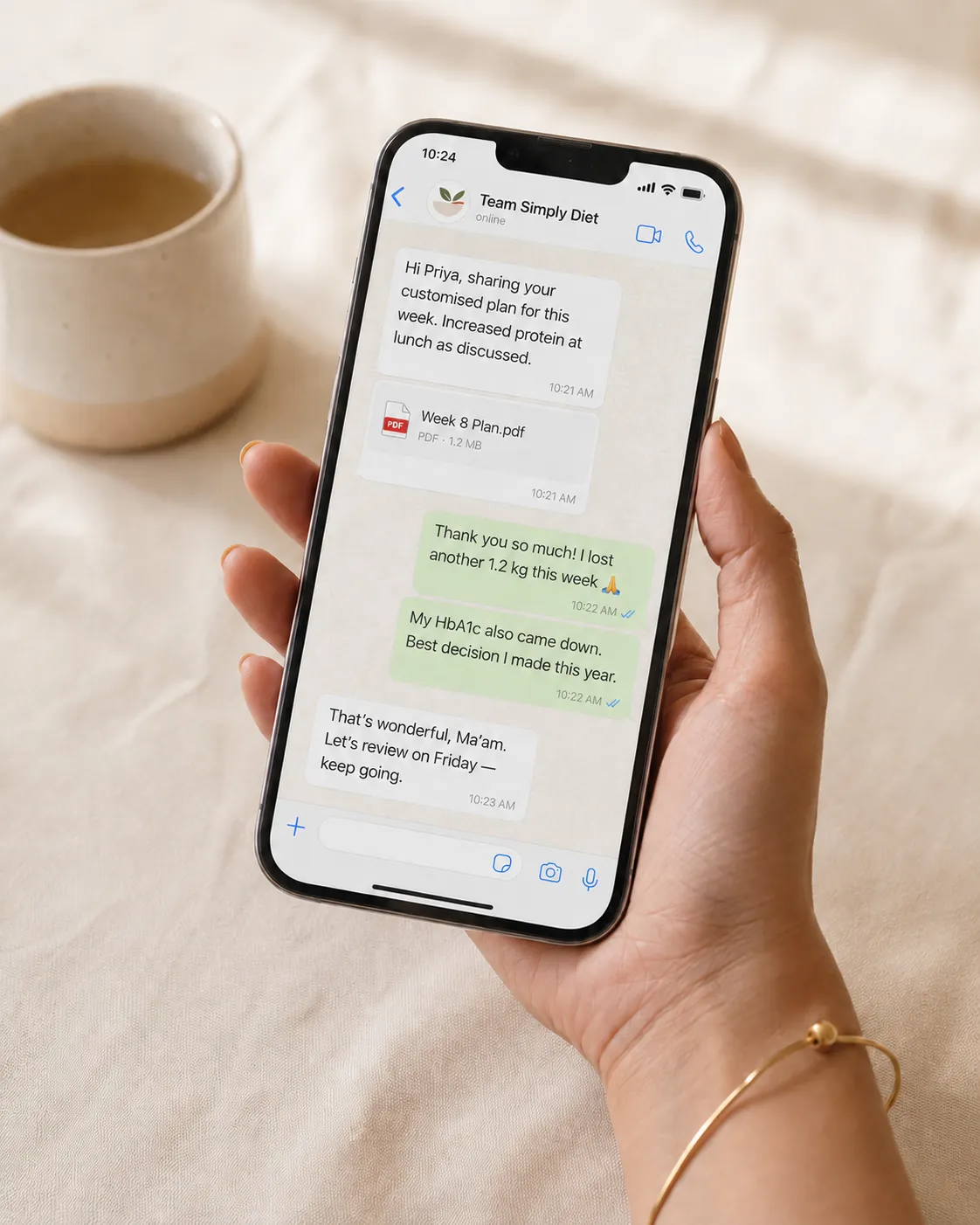 A client reading her weekly plan from the Simply Diet team on her phone